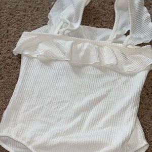 White ruffle body suit